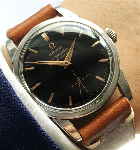 omega black dial watch price|replacement strap for omega seamaster.